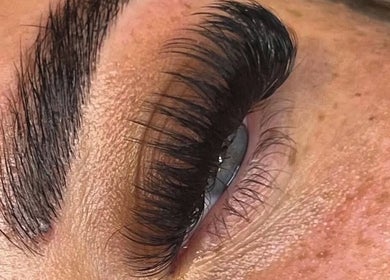 Close-up of professionally applied lush eyelashes at Beyond Beauty Training Academy, Glasgow, Scotland, GB.