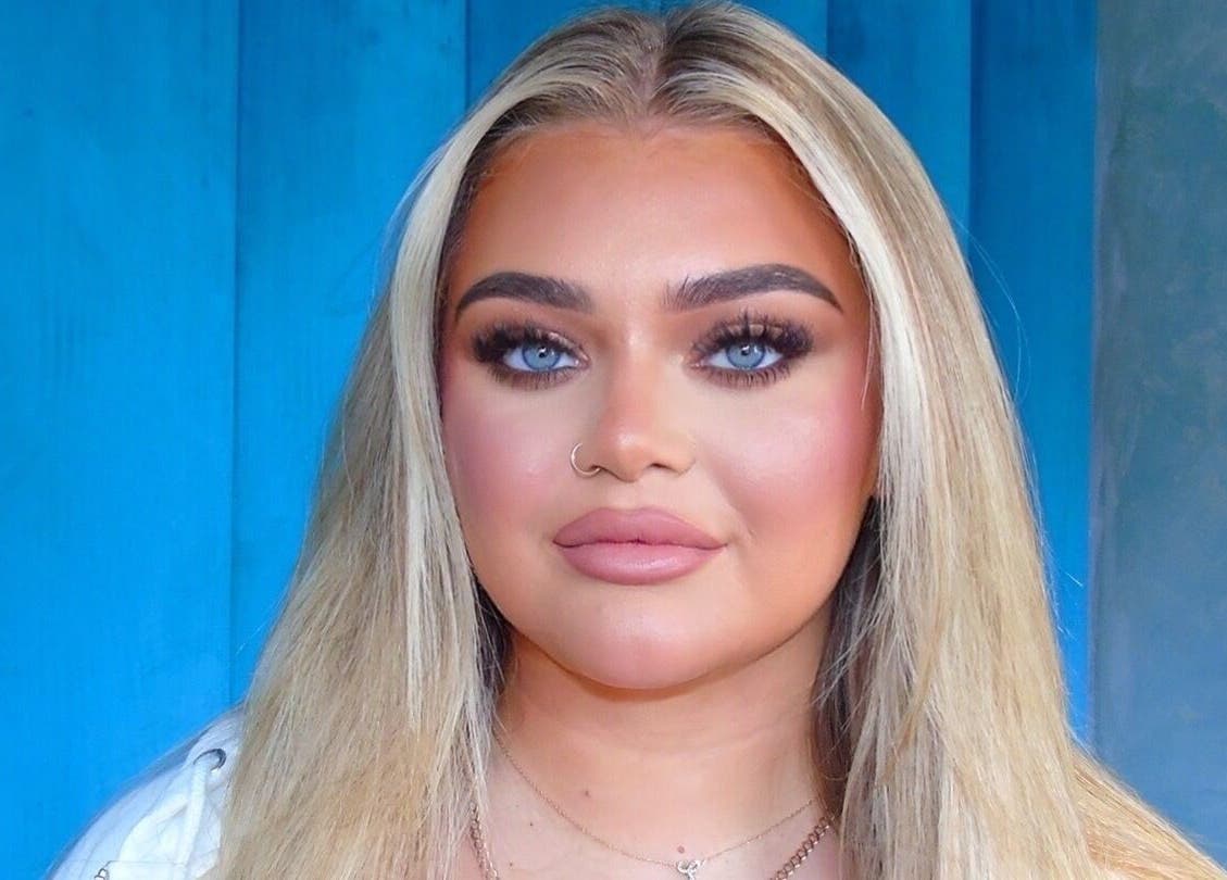 A woman with flawless makeup at Beyond Beauty Training Academy, Glasgow, Scotland, GB.