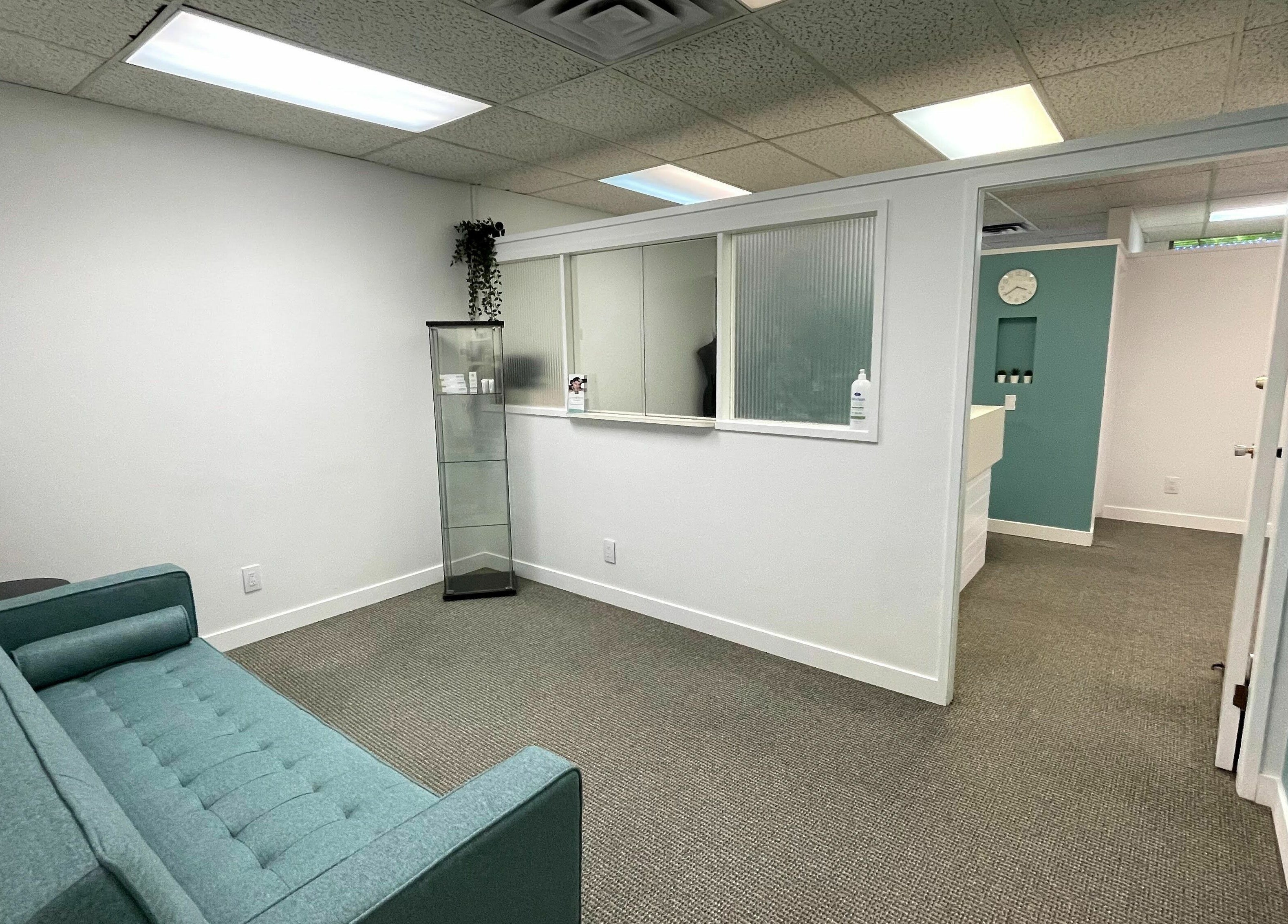 Relaxing lounge at Clarico Electrolysis + Advanced Aesthetics, Vancouver, British Columbia, CA. Sleek modern decor.