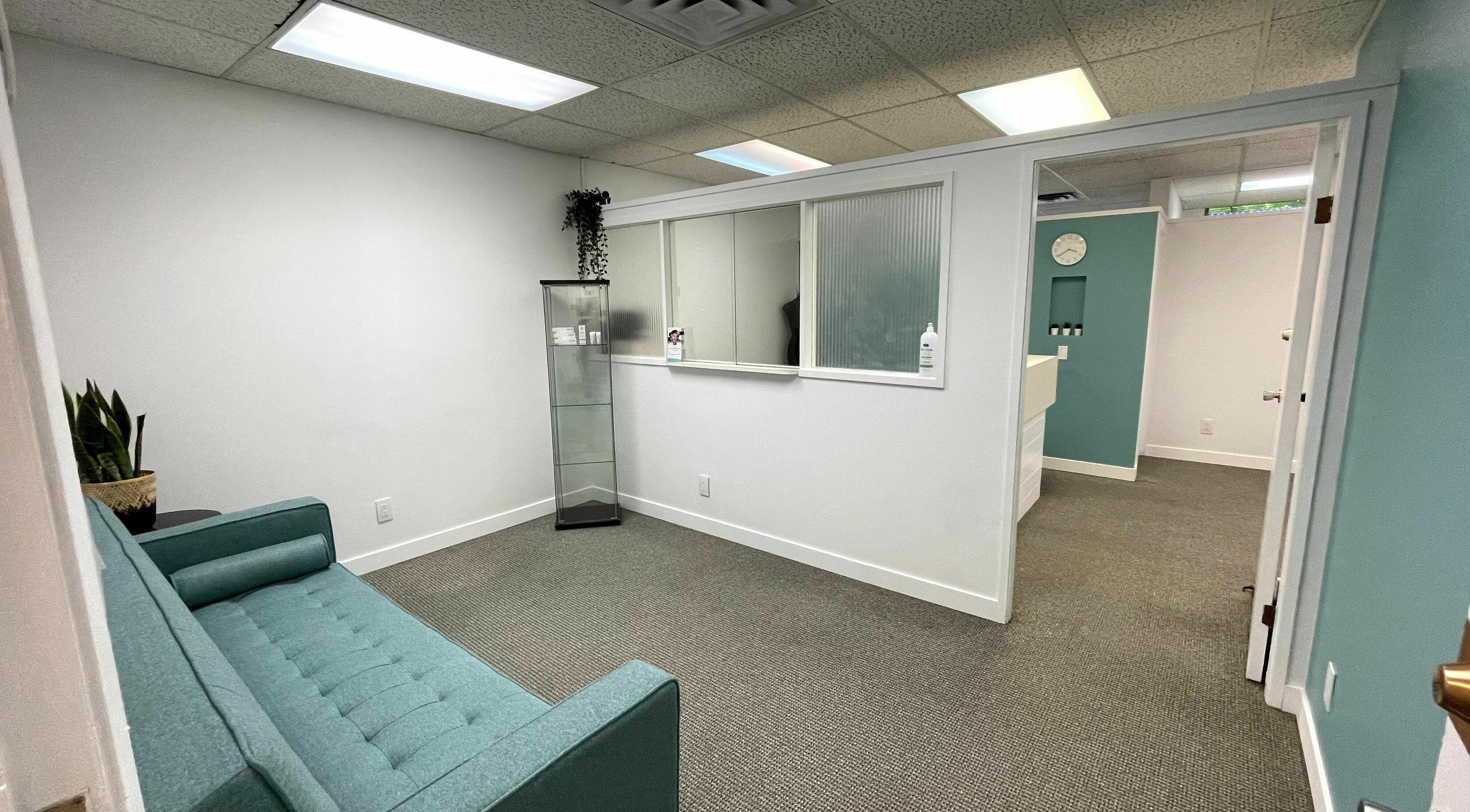 Relaxing lounge at Clarico Electrolysis + Advanced Aesthetics, Vancouver, British Columbia, CA. Sleek modern decor.