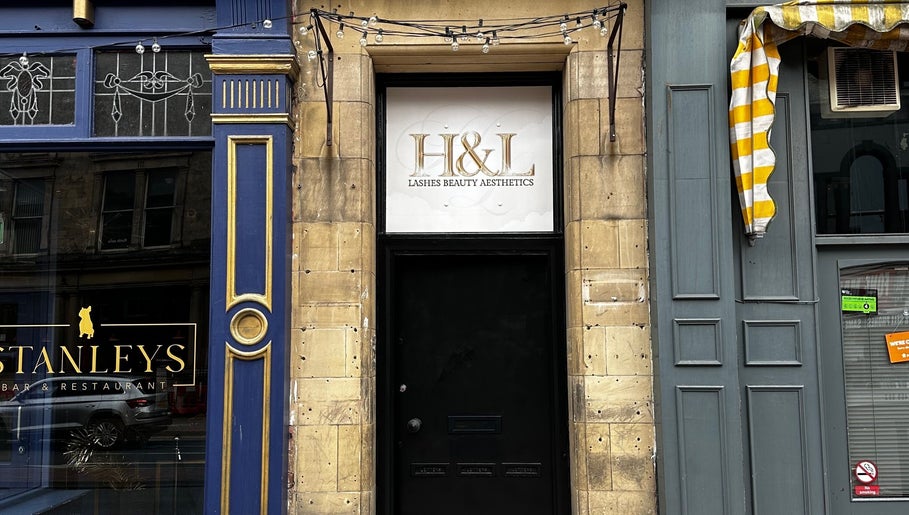 Entrance to H&L Lashes Beauty Aesthetics, Carlisle, England; elegant facade with signage.