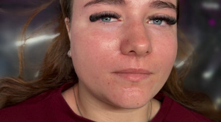 Woman with elegant lashes from H&L Lashes Beauty Aesthetics, Carlisle, England, GB, showcasing natural look.