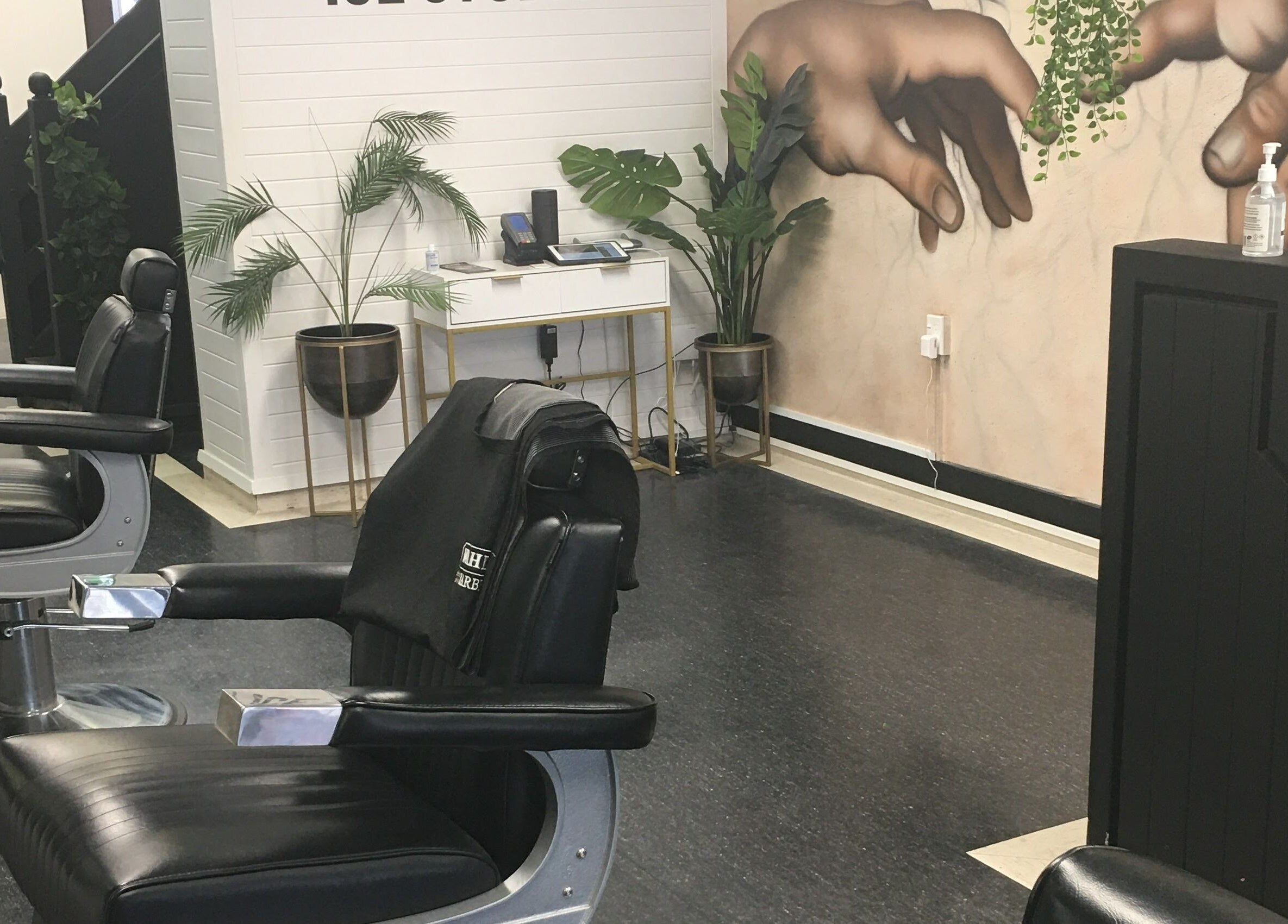 Modern barber chairs and stylish decor at Ice Studios in Palmerston North, Manawatu-Wanganui, NZ.