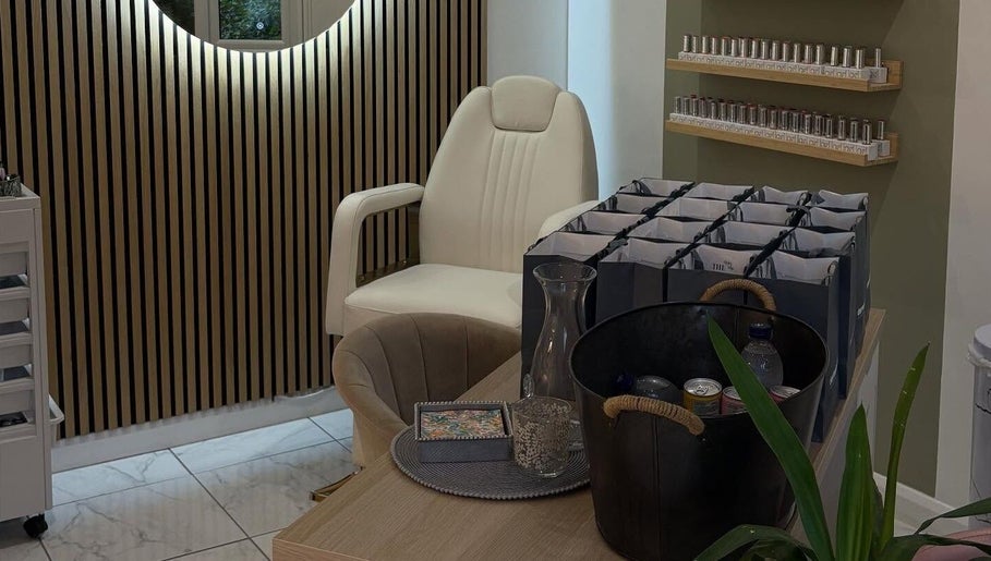 Elegant beauty corner at The Beauty Shack, Failand, England, GB. Comfortable chairs and display shelves add style.