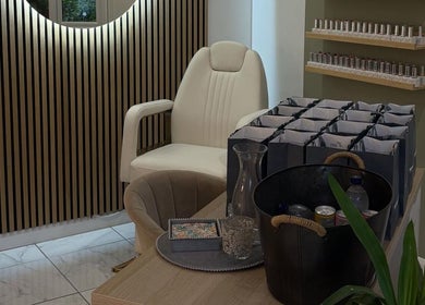 Elegant beauty corner at The Beauty Shack, Failand, England, GB. Comfortable chairs and display shelves add style.