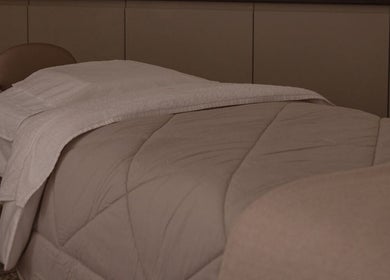Comfortable treatment bed at The Beauty Shack in Failand, England, GB, ready for a relaxing session.