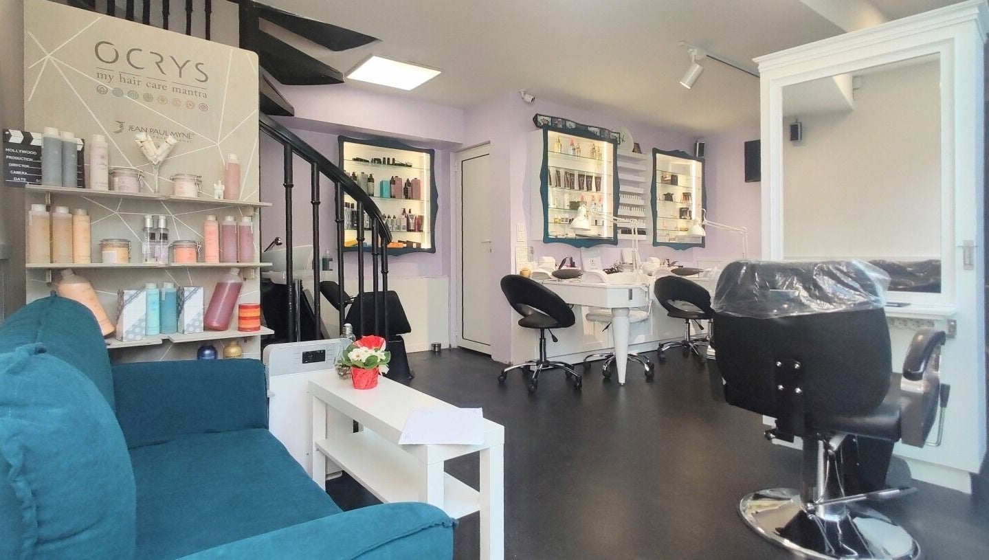 Interior of Фризьорски Салон 'Wave Studio' - НДК in Sofia, Sofia City Province, BG featuring seating and product shelves.