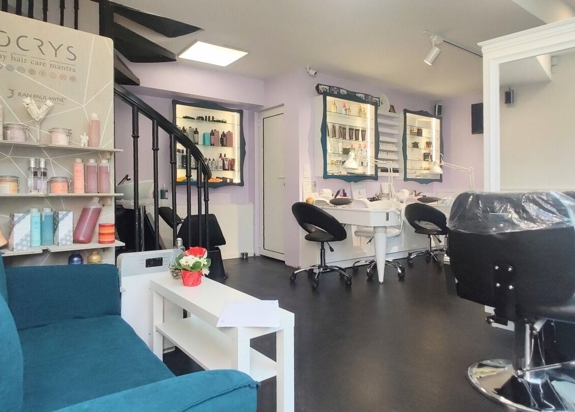 Interior of Фризьорски Салон 'Wave Studio' - НДК in Sofia, Sofia City Province, BG featuring seating and product shelves.