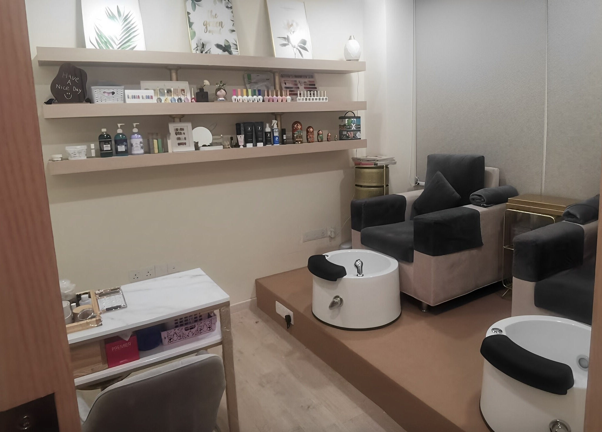 M Nail Bar Studio in Gelang Patah, Johor, MY offers plush manicure and pedicure seats in a calm, elegant setting.