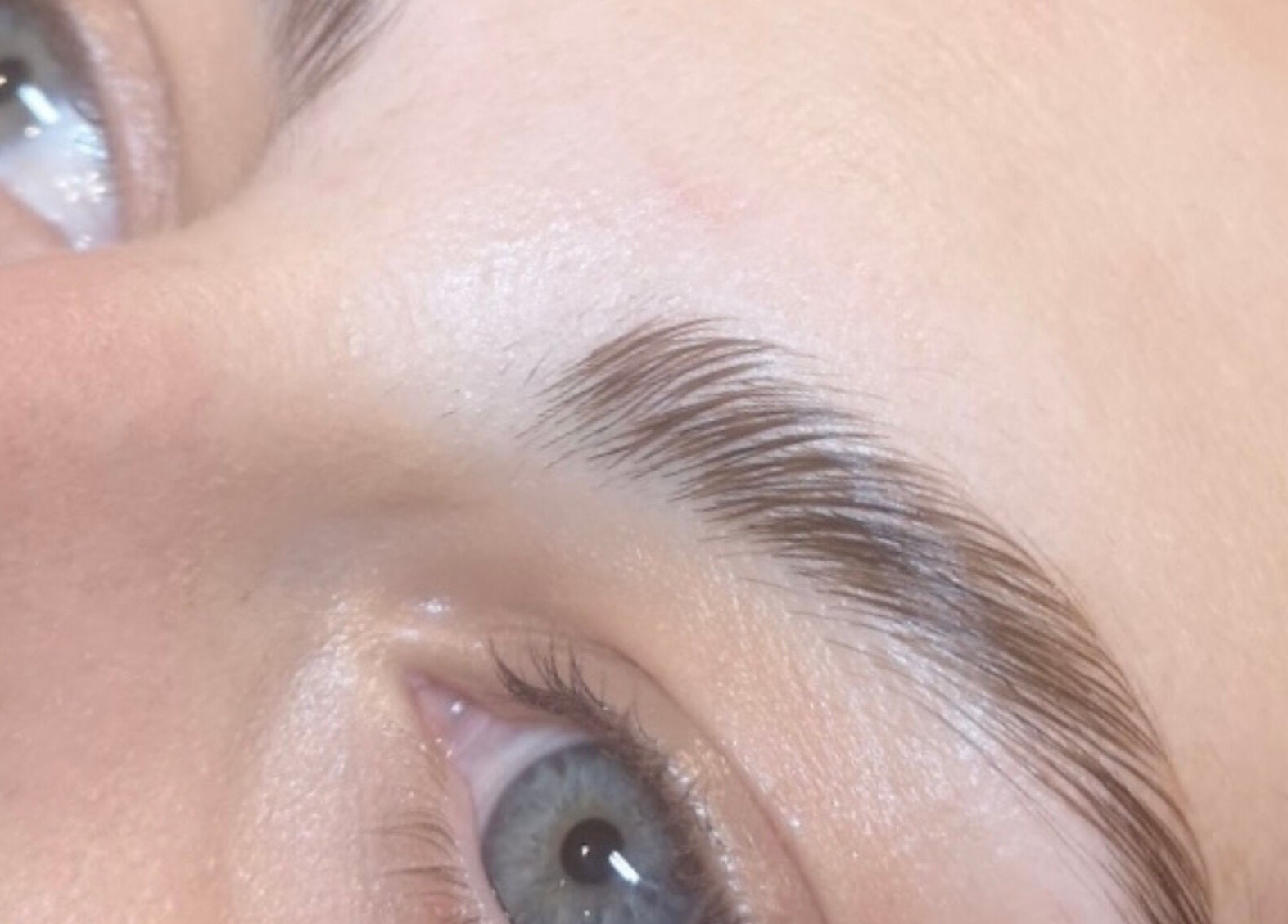 Close-up of perfectly shaped eyebrows at Iris Avenue in London, England, GB.