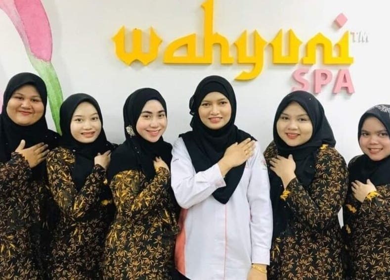 Friendly team at Wahyuni Spa Kangar, Perlis, MY, ready to welcome clients with warm smiles.