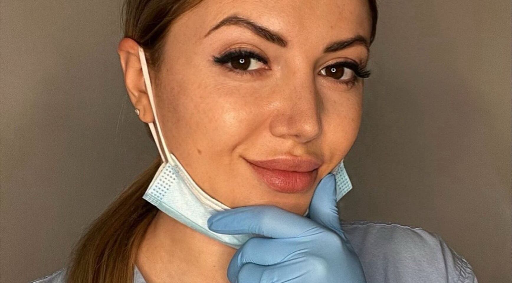 Professional at Saidi Nails smiles, showcasing vibrant beauty care in Limassol, Limassol, CY.