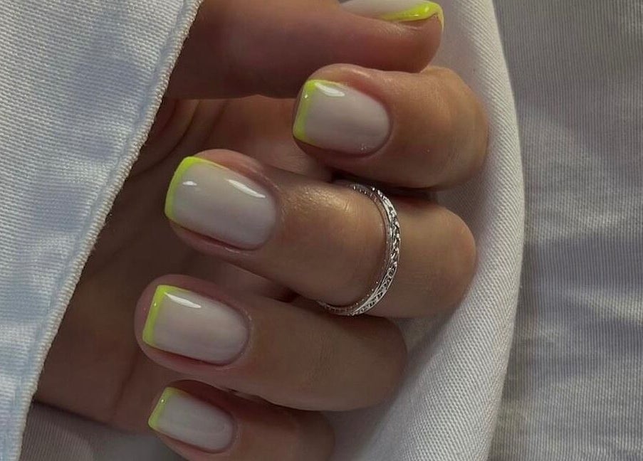 Stylish neon-tipped manicure from Saidi Nails, Limassol, Limassol, CY to enhance your look.