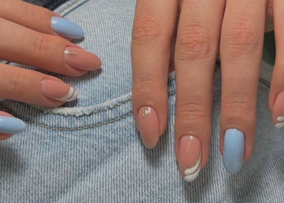 Stylish nails with blue and peach design at Saidi Nails, Limassol, Limassol, CY.