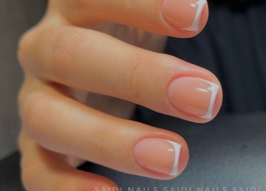 Close-up of French manicure at Saidi Nails, Limassol, Limassol, CY, showcasing elegant nail design.
