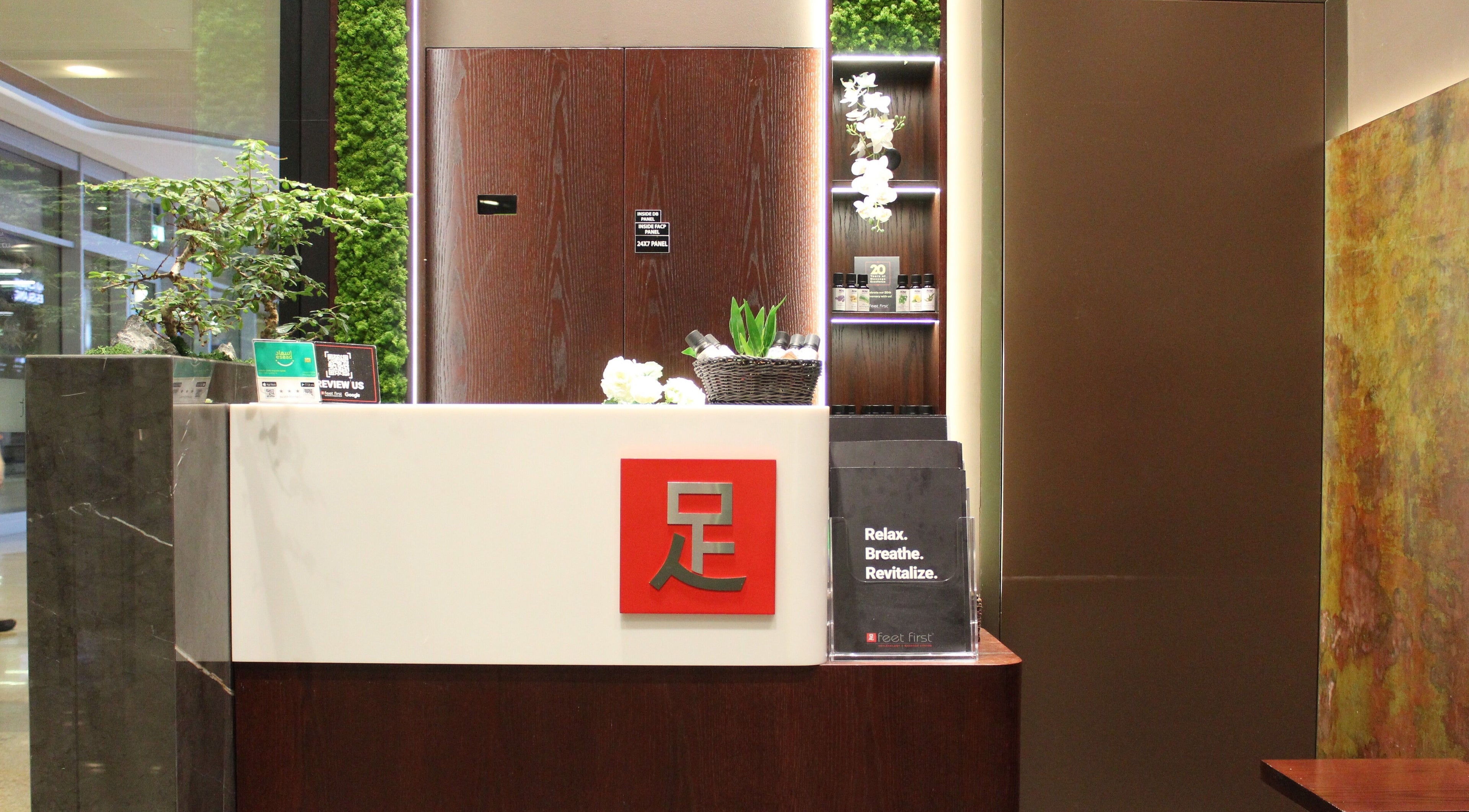 Reception area at Feet First Reflexology and Massage in Dubai Mall, Dubai, AE with lush decor.