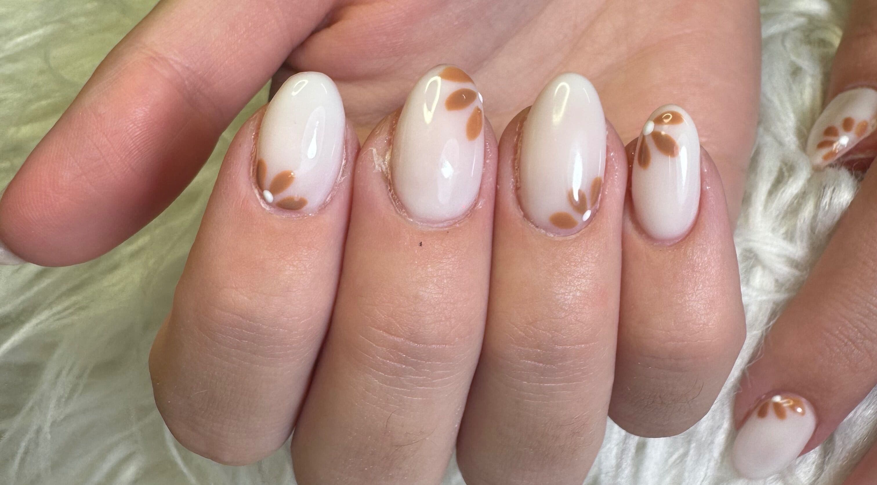 Stylish floral nail design at Amity Beauty Salon, Potchefstroom, North West, ZA.