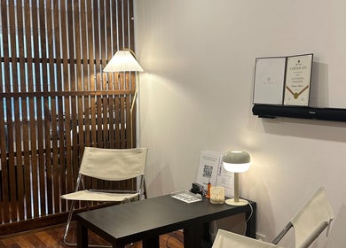 Cozy waiting area at sophialashes.x.ribbon, Melbourne, Victoria, AU with chairs and ambient lighting.