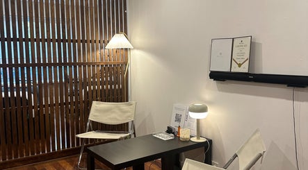 Cozy waiting area at sophialashes.x.ribbon, Melbourne, Victoria, AU with chairs and ambient lighting.
