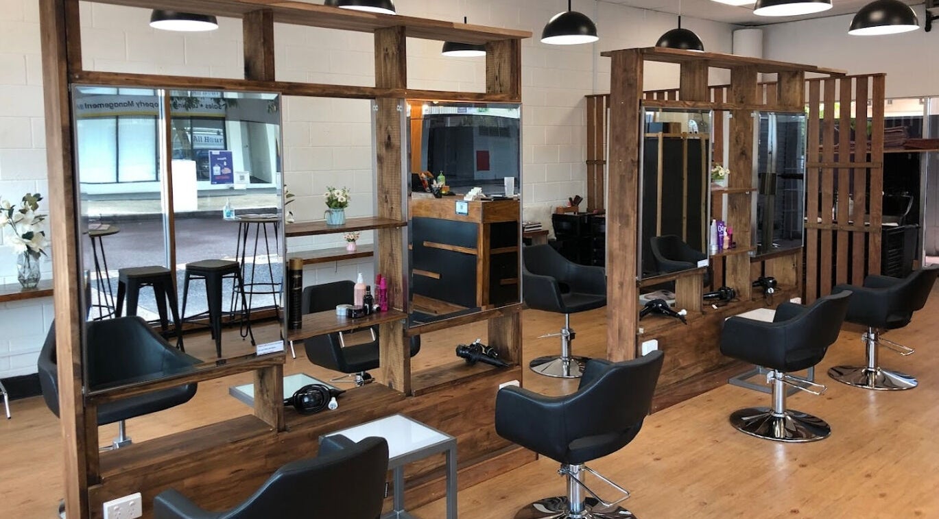 Interior of Ribbon Hair - Darwin salon with modern chairs and mirrors, Darwin City, Northern Territory, AU.