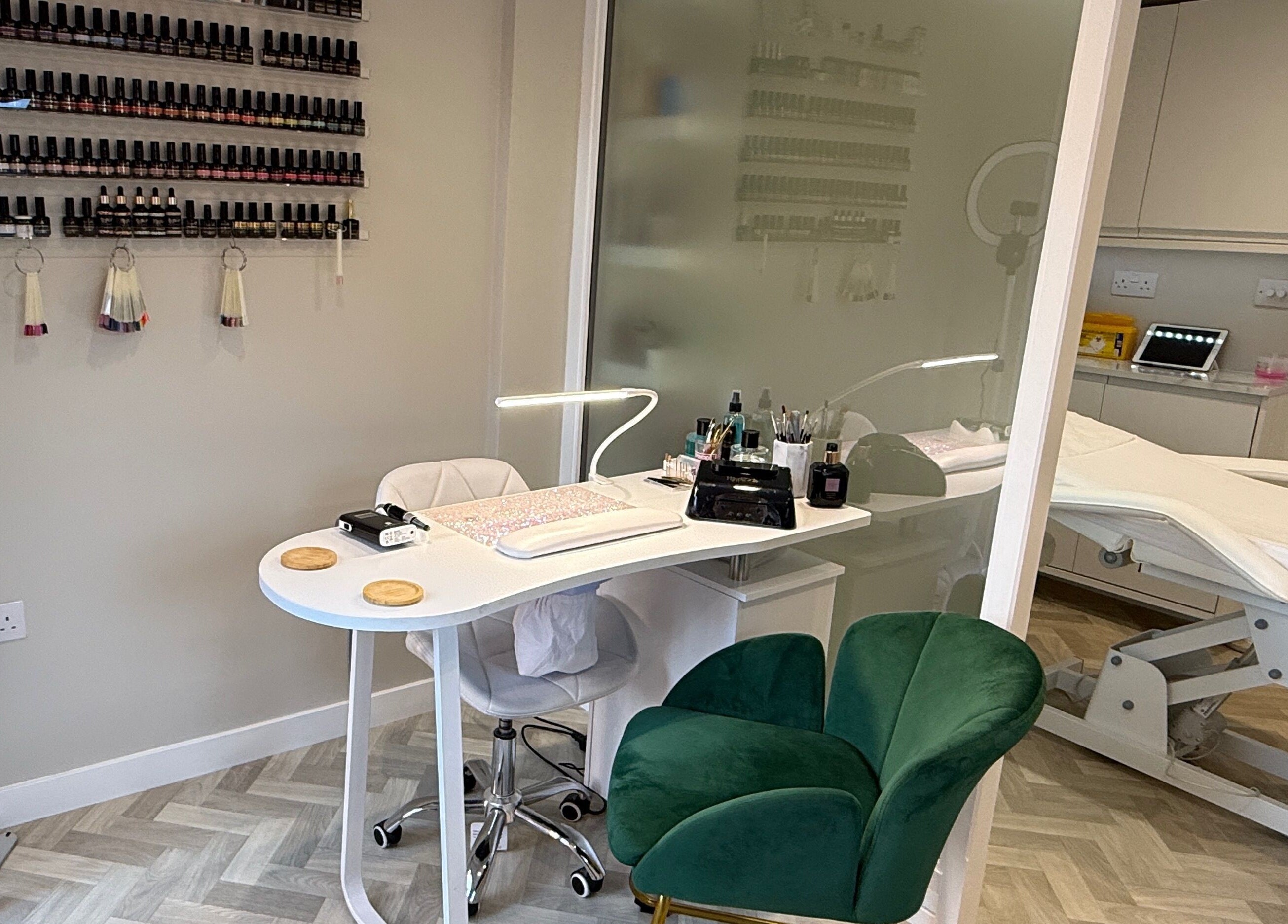 Plush Beauty Box's stylish nail area in Exeter, England, GB, showcasing manicure tools and modern decor.