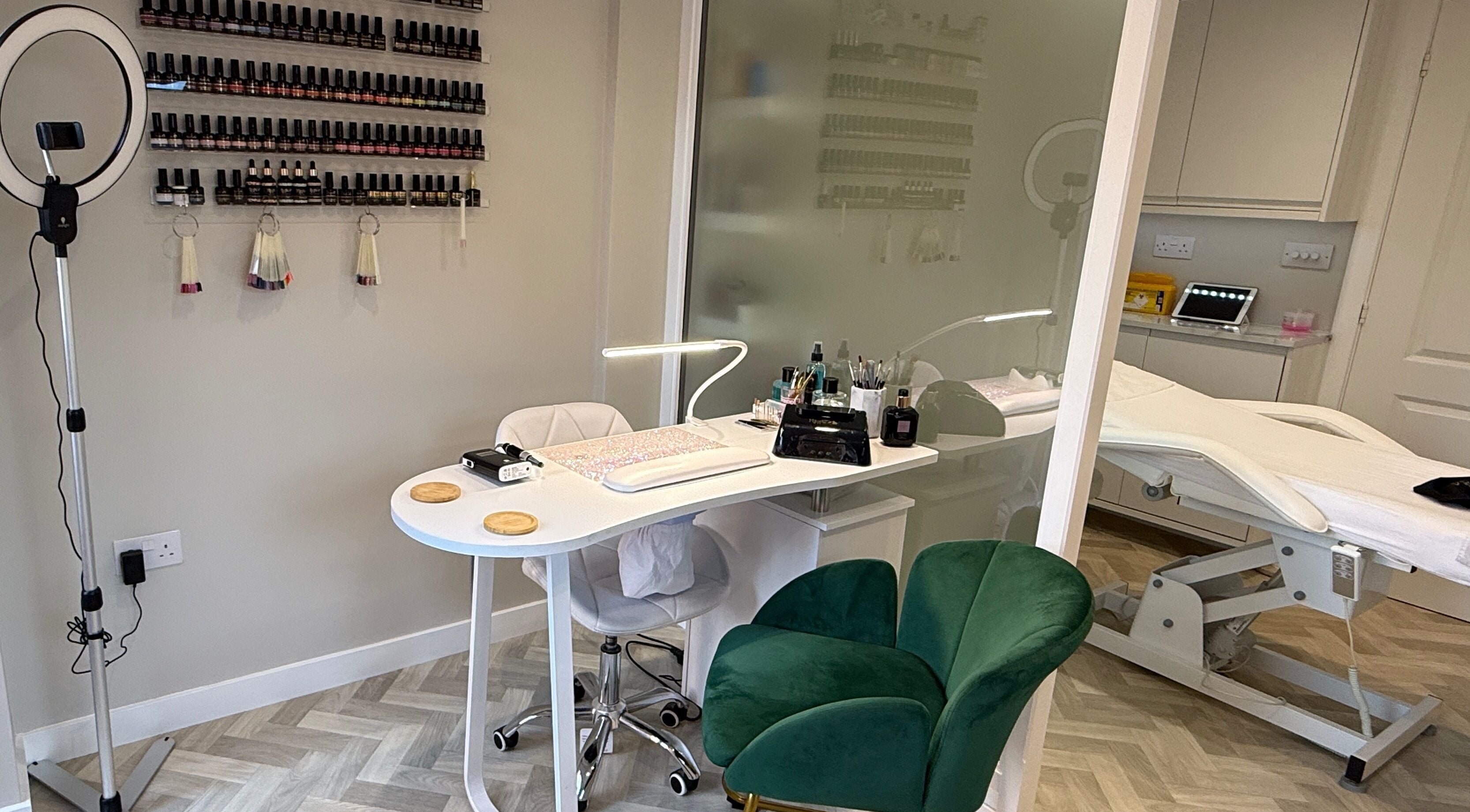Plush Beauty Box's stylish nail area in Exeter, England, GB, showcasing manicure tools and modern decor.