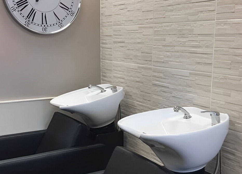 Elegant wash stations at Mac Hair, Southampton, England, GB, offering a modern beauty experience.