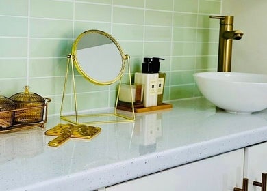 Elegant vanity at Emma Rose Aesthetics & Laser Clinic, Bristol, England, GB featuring a mirror and chic decor.