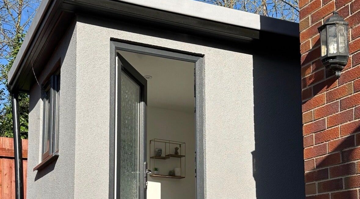 Entrance to Emma Rose Aesthetics & Laser Clinic, Bristol, England, GB, showcasing a modern exterior in sunlight.