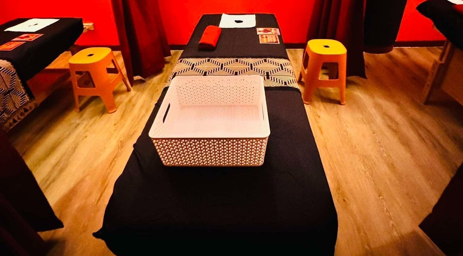 Tranquil massage room at Bamboo Spa Papakura, Auckland. Warm ambiance enhances relaxation.