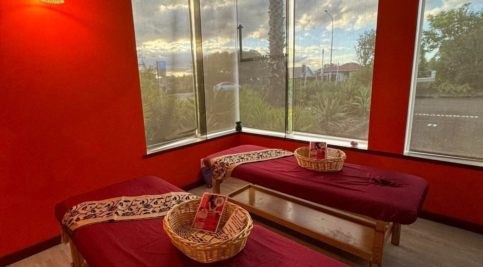 Relaxing massage room at Bamboo Spa Chatswood Northshore, Auckland, NZ with two elegant massage beds.