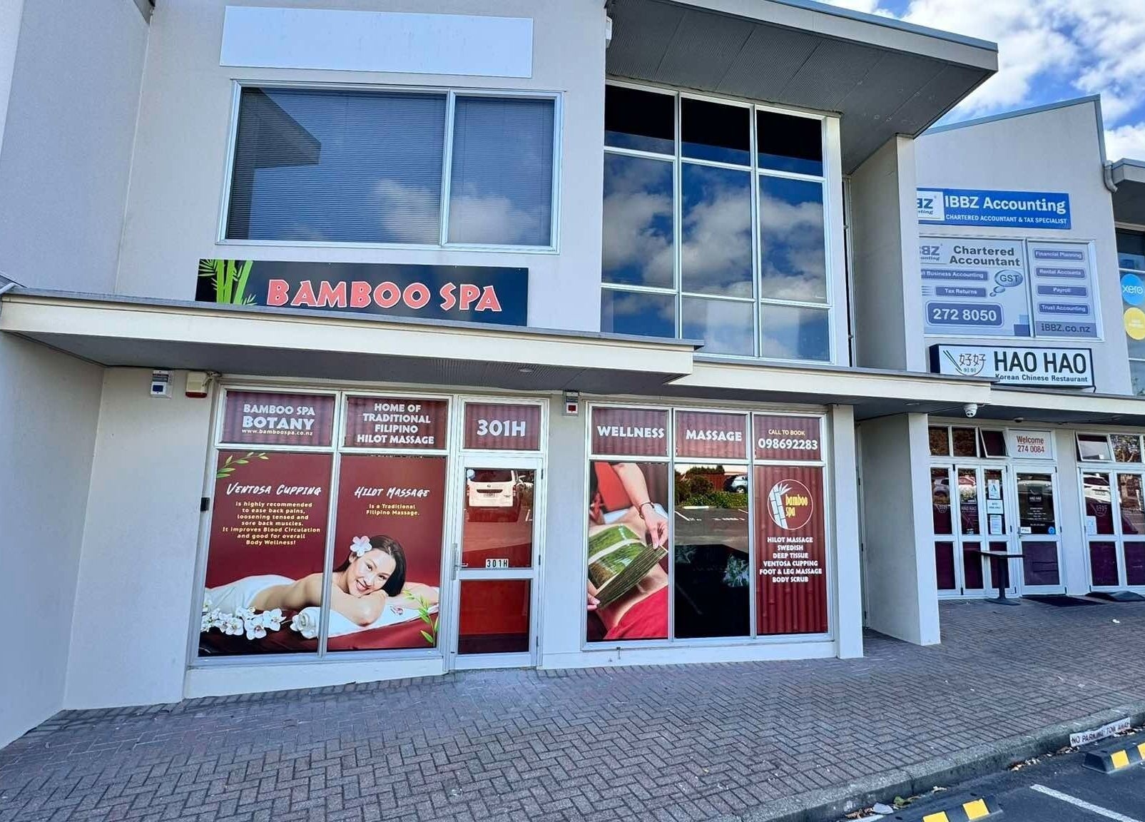 Front view of Bamboo Spa Botany, located in Auckland, Auckland, NZ. Modern facade with spa signage.