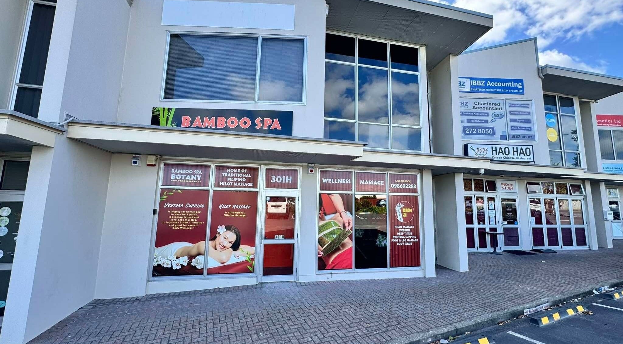 Front view of Bamboo Spa Botany, located in Auckland, Auckland, NZ. Modern facade with spa signage.