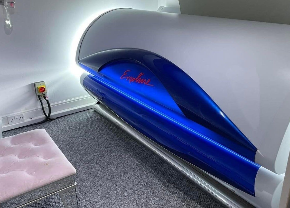 Sleek tanning bed at Beauty Within, Bristol, England, GB, offering modern sunbed services for a radiant glow.