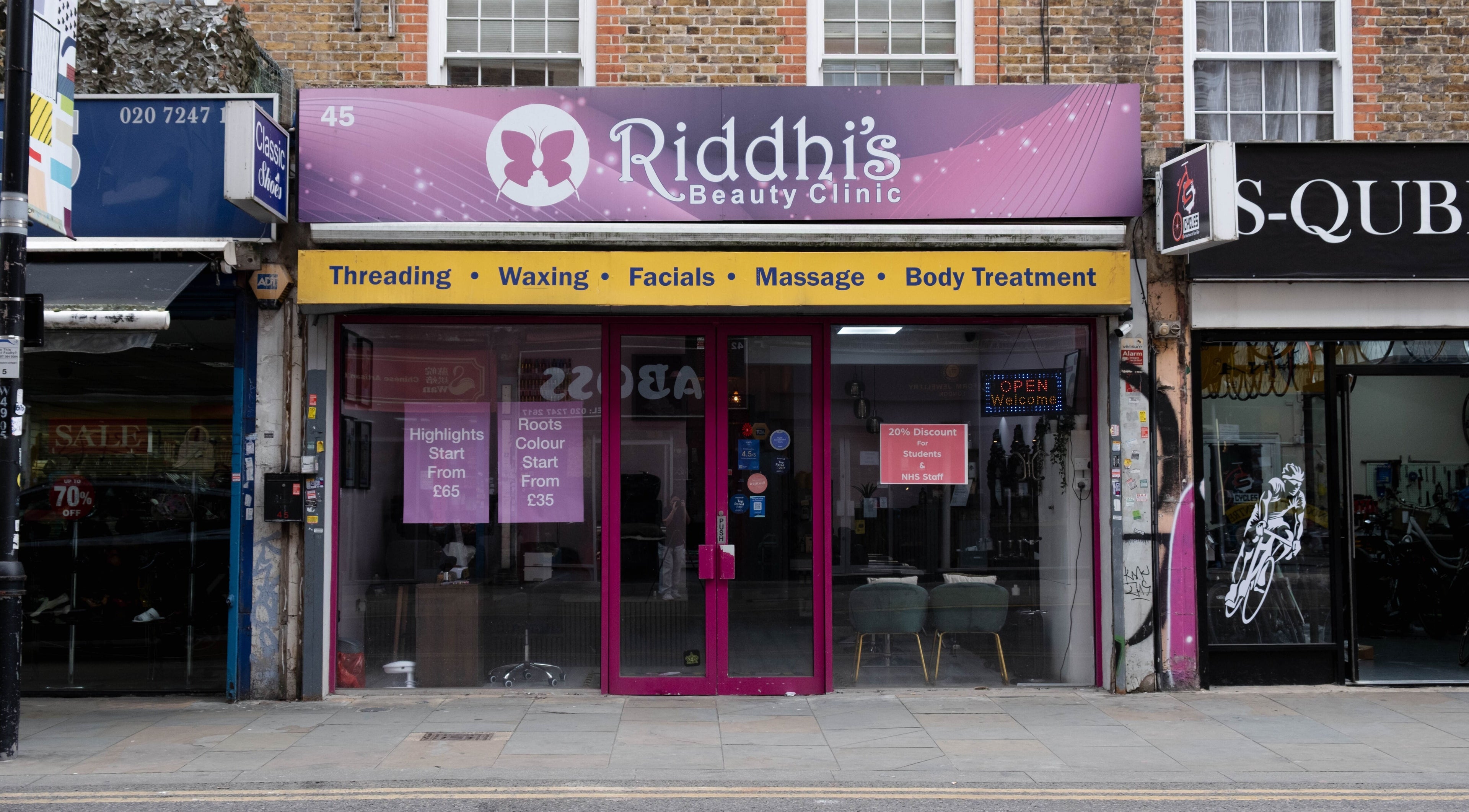Front view of Riddhis Beauty Clinic in London, England, GB showcasing beauty services signage.