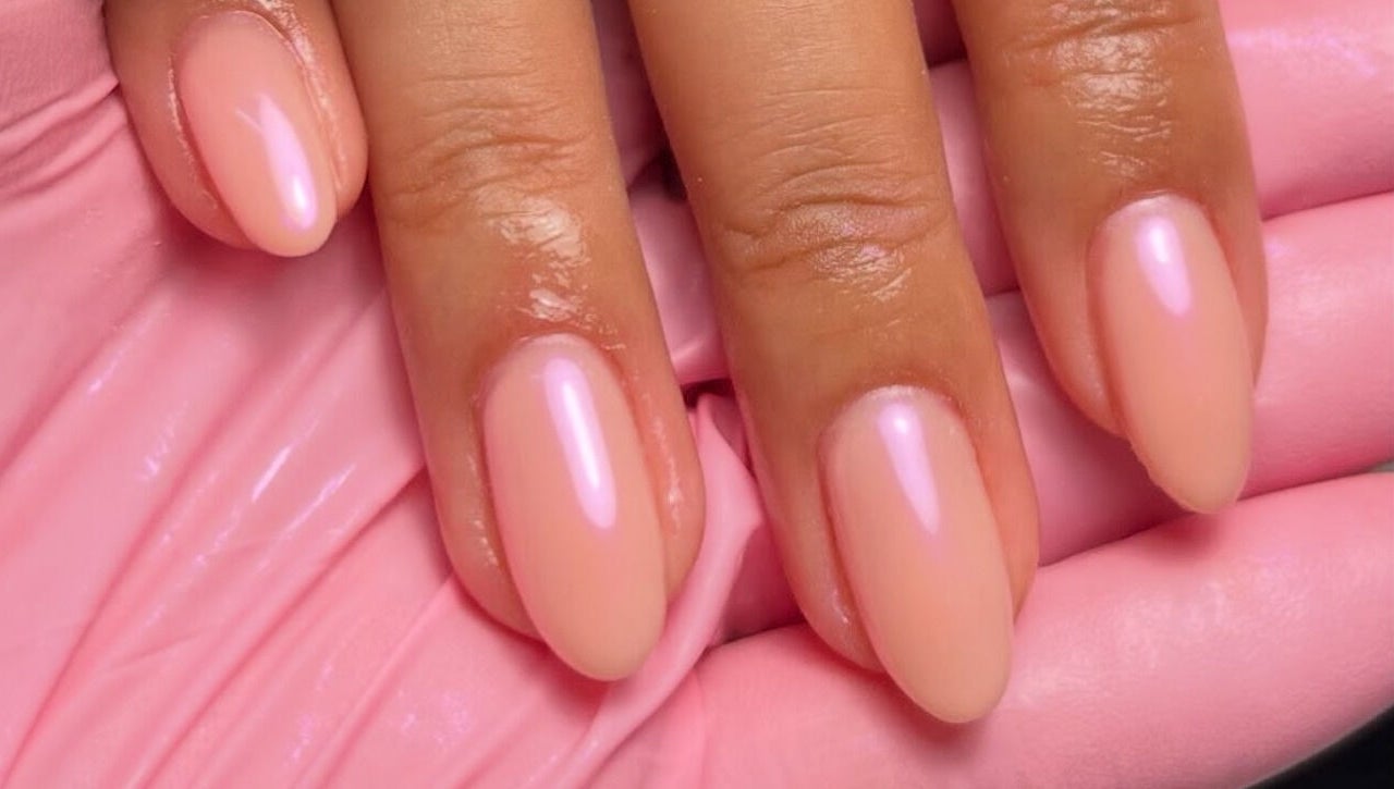 Elegant pink manicure at Nails By Teyah B, Manchester, England, GB, showcasing glossy almond-shaped nails.