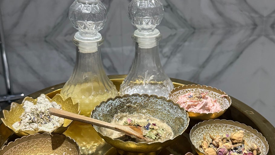 Spa herbal bowls and glass jars at Hola Spa and Cafe, Al Batinah South Governorate, OM.