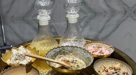 Spa herbal bowls and glass jars at Hola Spa and Cafe, Al Batinah South Governorate, OM.
