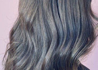 Glossy wavy hairstyle at Hola Spa and Cafe in Al Batinah South Governorate, OM.