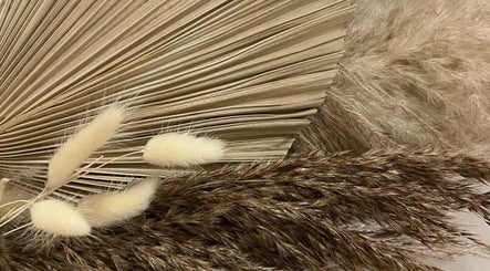 Elegant dried floral arrangement at Sisters Beauty Co., Costock, England, GB.