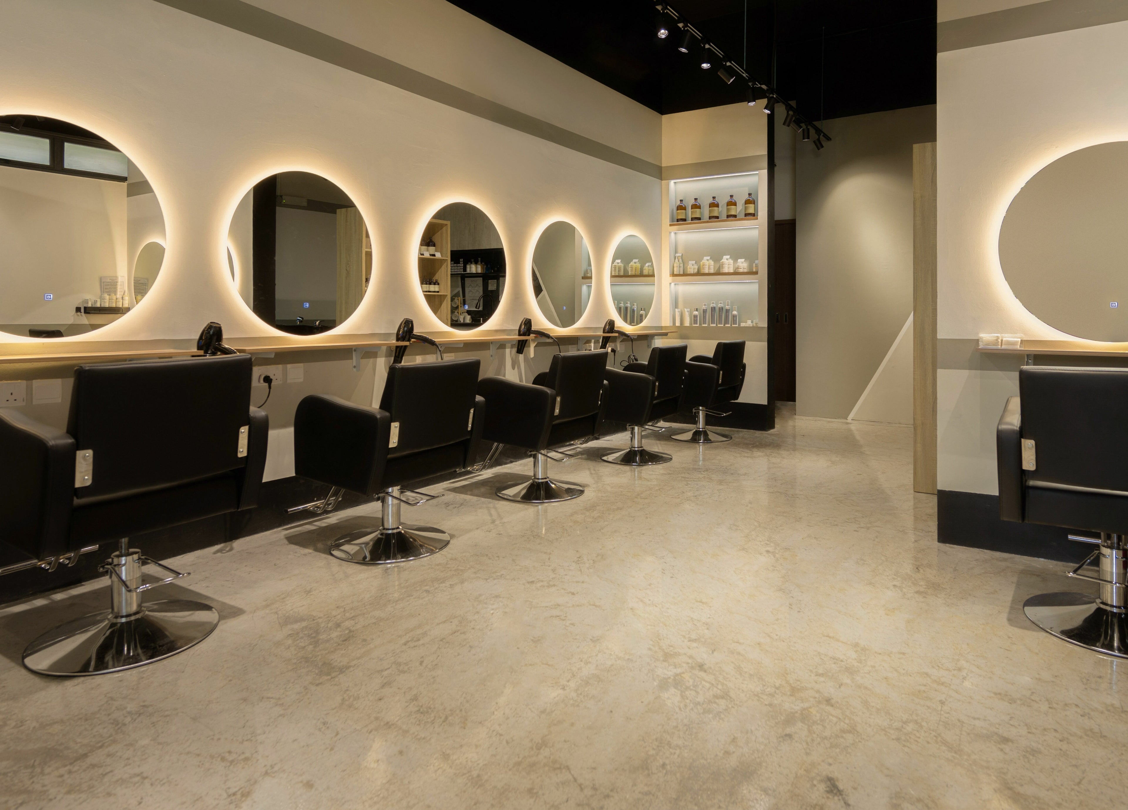 Modern salon chairs and mirrors at Hair by Common Studio - Queenstown, Singapore, Singapore, SG.