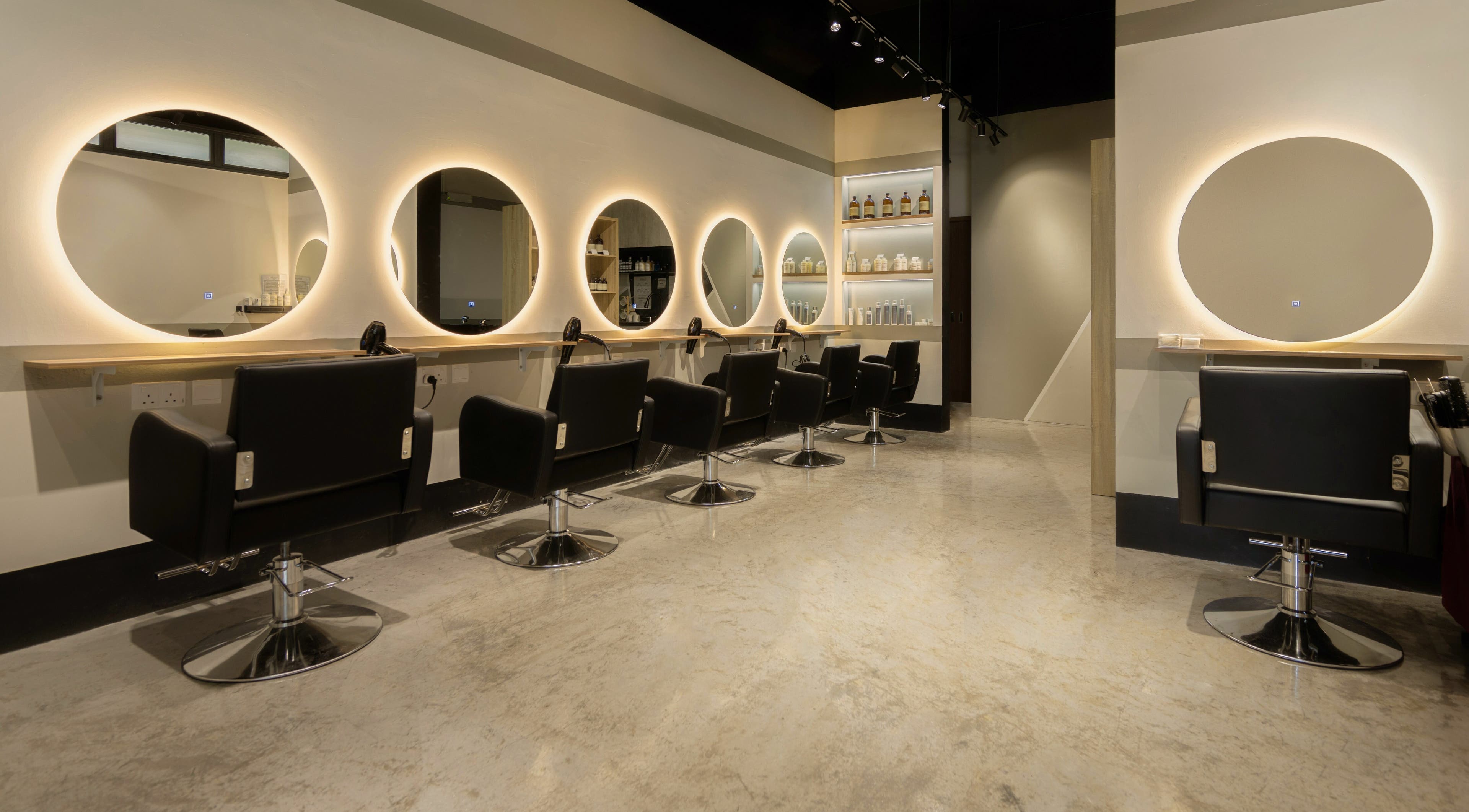 Modern salon chairs and mirrors at Hair by Common Studio - Queenstown, Singapore, Singapore, SG.