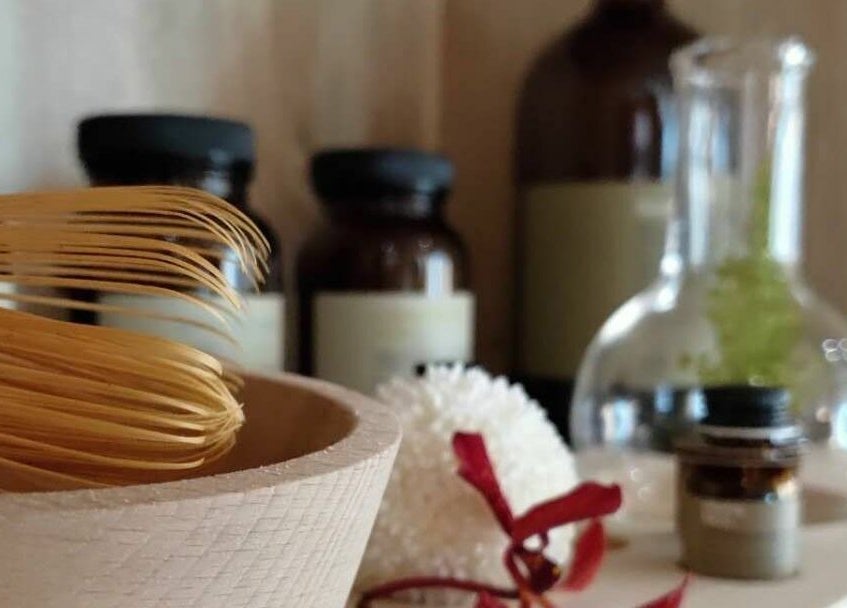 Natural wellness essentials at Hair by Common Studio - Queenstown, Singapore, SG. A serene display of beauty products.