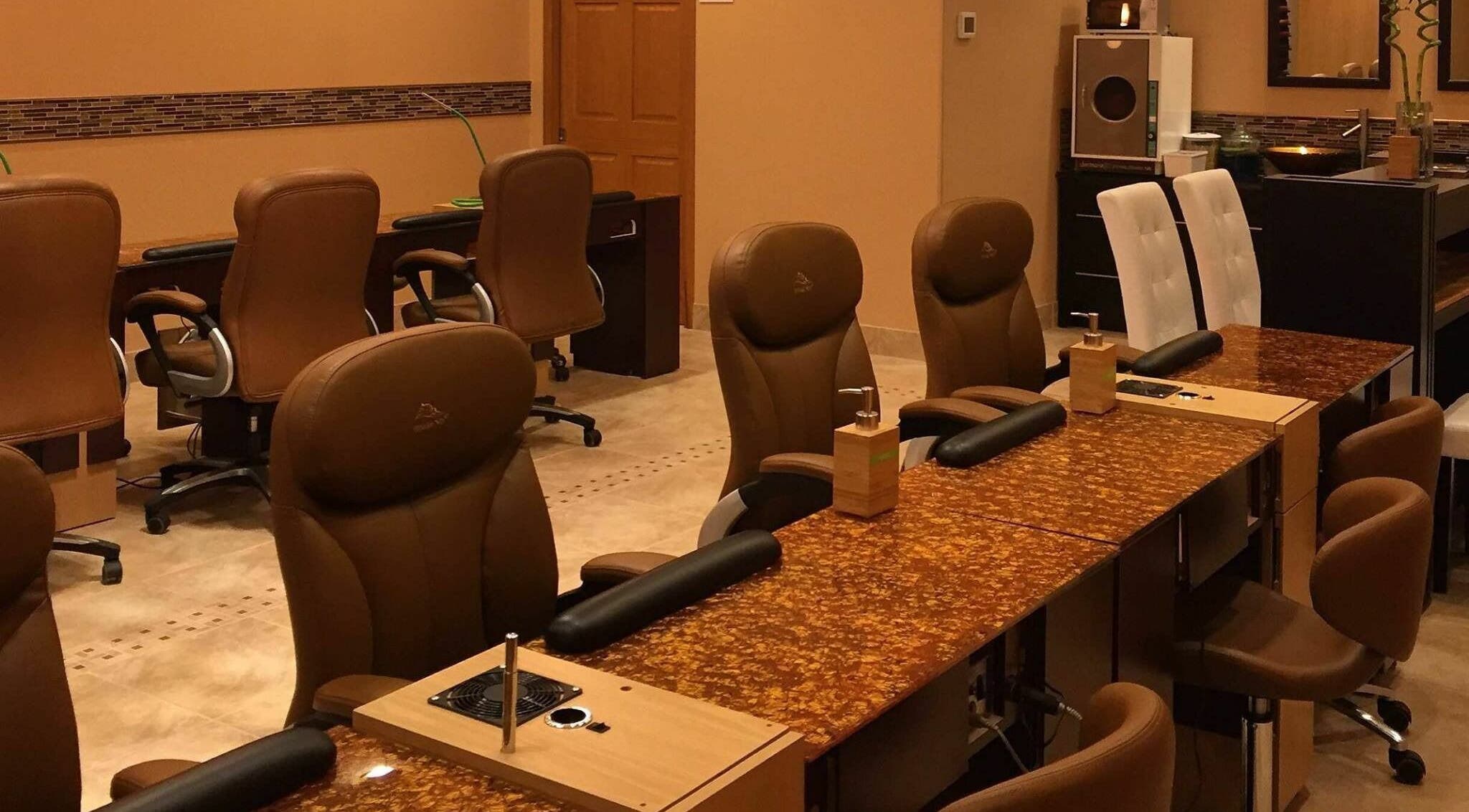Elegant manicure stations at Evol Nails and Spa in St. Cloud, Minnesota, US offering a serene spa experience.