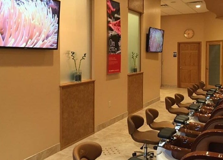 Relaxing pedicure chairs at Evol Nails and Spa, St. Cloud, Minnesota, US. Elegantly designed interior.