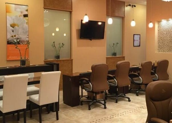 Interior view of Evol Nails and Spa in St. Cloud, Minnesota showcasing a modern nail salon setup.