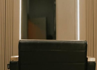 Stylish salon chair at Colour by Laura, Belfast, Northern Ireland, GB, ensures a luxurious experience.