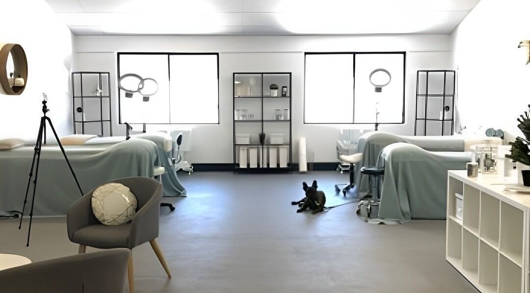 Calm interior of Beautifeyes Studio in Botany, New South Wales, AU with treatment beds and soft lighting.