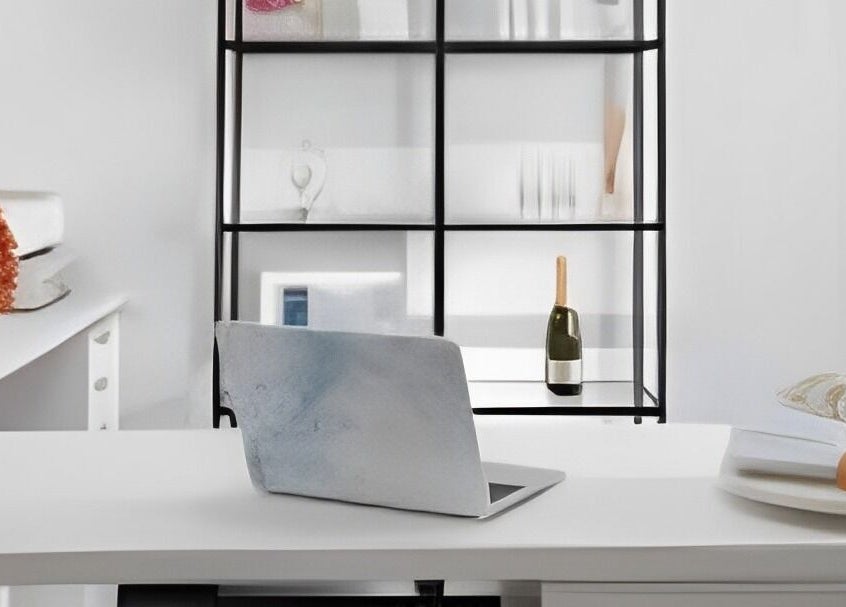 Modern workspace at Beautifeyes Studio in Botany, New South Wales, AU with laptop and stylish decor.