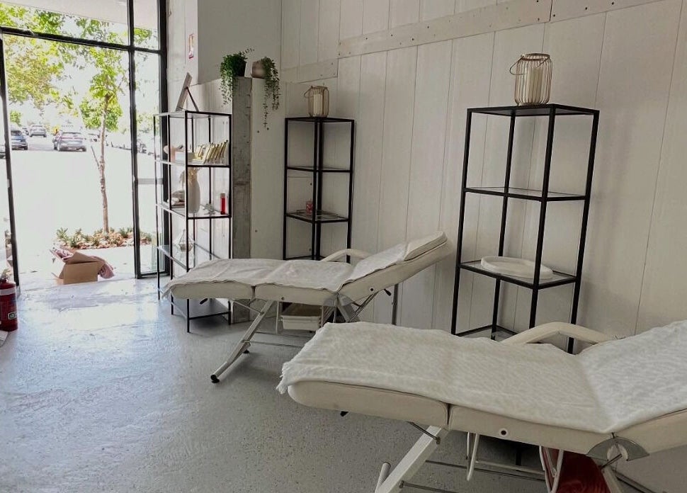 Relaxing treatment room at Sydney Teeth Whitening in Botany, New South Wales, AU with cozy beds and natural light.